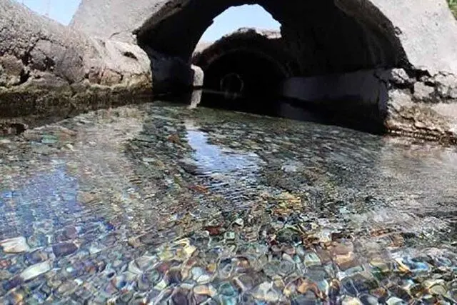 تخریب بخش‌هایی از یک قنات جهانی و بازار تاریخی سیرجان در بارندگی_694b7e7b78571.webp